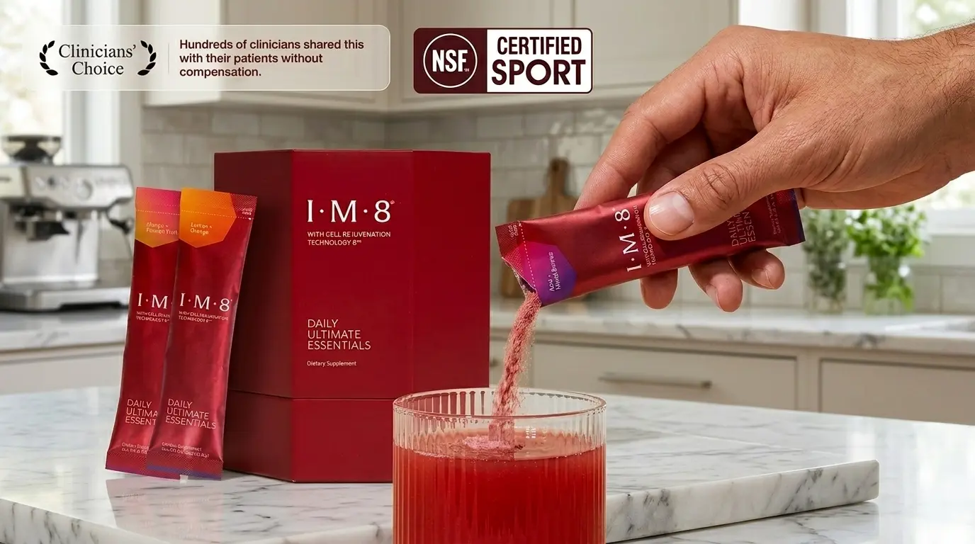 David Beckham holding an IM8 supplement drink with IM8 product boxes